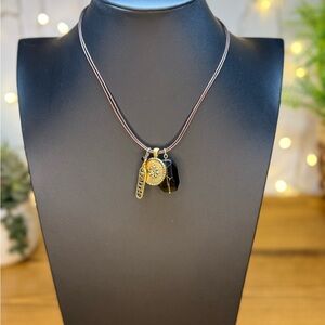 Chico's Black and Gold Charm Necklace